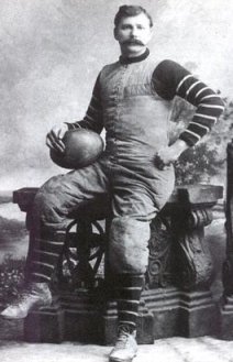 Abraham Strubu Jr. with the first football.  Ever.
